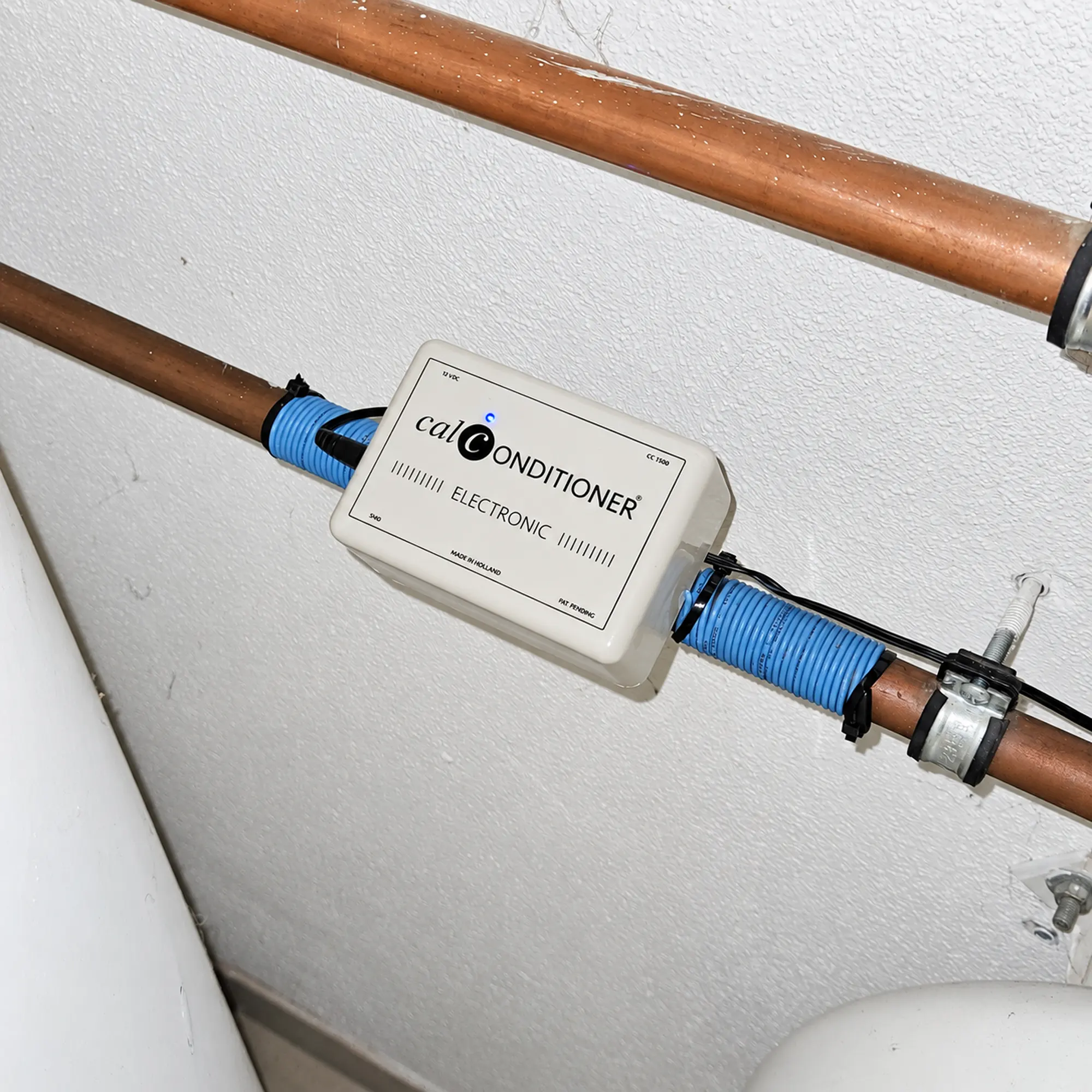 Calconditioner CC1500 aangesloten op een koperen waterleiding